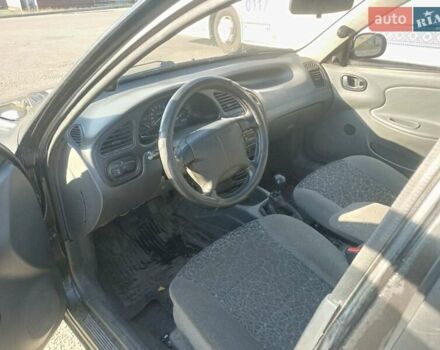 Чорний Деу Ланос, об'ємом двигуна 1.5 л та пробігом 184 тис. км за 3000 $, фото 4 на Automoto.ua