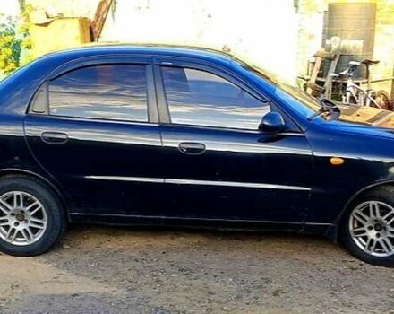 Черный Дэу Ланос, объемом двигателя 1.39 л и пробегом 233 тыс. км за 2200 $, фото 1 на Automoto.ua