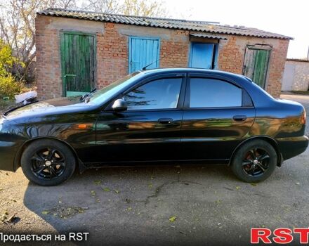 Чорний Деу Ланос, об'ємом двигуна 1.6 л та пробігом 238 тис. км за 2700 $, фото 3 на Automoto.ua