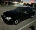 Черный Дэу Ланос, объемом двигателя 1.5 л и пробегом 182 тыс. км за 3700 $, фото 1 на Automoto.ua