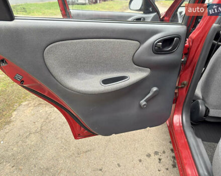 Черный Дэу Ланос, объемом двигателя 1.6 л и пробегом 156 тыс. км за 2400 $, фото 15 на Automoto.ua