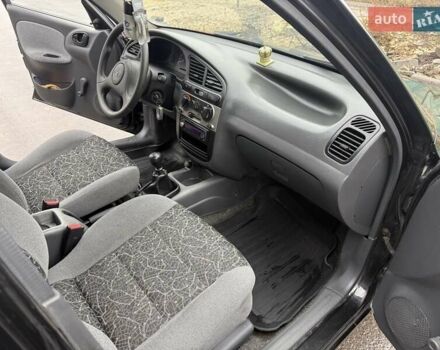 Черный Дэу Ланос, объемом двигателя 1.5 л и пробегом 128 тыс. км за 2999 $, фото 52 на Automoto.ua