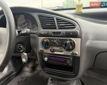 Черный Дэу Ланос, объемом двигателя 1.5 л и пробегом 128 тыс. км за 2999 $, фото 55 на Automoto.ua