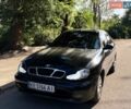 Черный Дэу Ланос, объемом двигателя 1.5 л и пробегом 240 тыс. км за 2657 $, фото 1 на Automoto.ua
