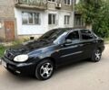 Черный Дэу Ланос, объемом двигателя 1.5 л и пробегом 220 тыс. км за 2600 $, фото 1 на Automoto.ua