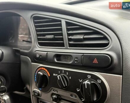 Черный Дэу Ланос, объемом двигателя 1.5 л и пробегом 128 тыс. км за 2999 $, фото 57 на Automoto.ua