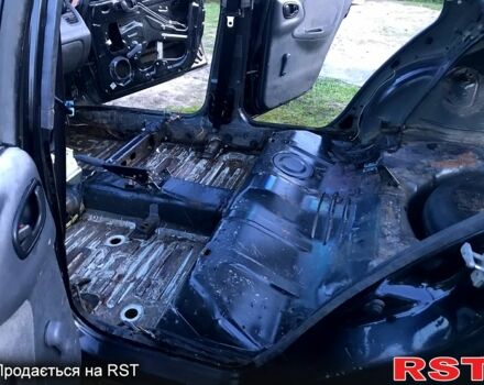 Черный Дэу Ланос, объемом двигателя 1.5 л и пробегом 368 тыс. км за 1150 $, фото 7 на Automoto.ua