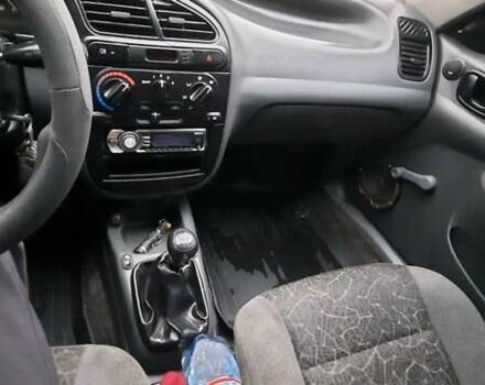 Черный Дэу Ланос, объемом двигателя 1.5 л и пробегом 450 тыс. км за 1750 $, фото 1 на Automoto.ua