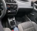 Черный Дэу Ланос, объемом двигателя 1.5 л и пробегом 450 тыс. км за 1750 $, фото 1 на Automoto.ua