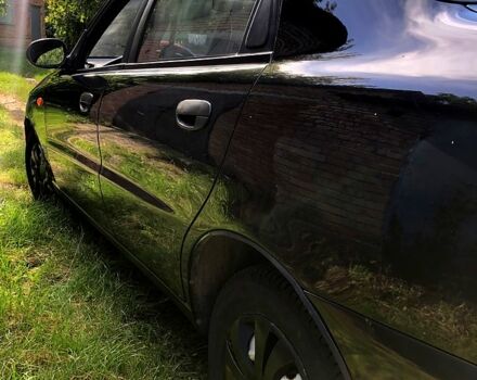 Чорний Деу Ланос, об'ємом двигуна 1.5 л та пробігом 162 тис. км за 2800 $, фото 5 на Automoto.ua