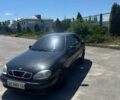 Черный Дэу Ланос, объемом двигателя 1.5 л и пробегом 300 тыс. км за 2500 $, фото 1 на Automoto.ua