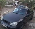 Черный Дэу Ланос, объемом двигателя 1.5 л и пробегом 180 тыс. км за 2250 $, фото 1 на Automoto.ua