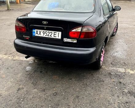 Черный Дэу Ланос, объемом двигателя 1.4 л и пробегом 202 тыс. км за 1400 $, фото 2 на Automoto.ua