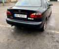 Черный Дэу Ланос, объемом двигателя 1.4 л и пробегом 202 тыс. км за 1400 $, фото 2 на Automoto.ua