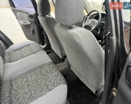 Черный Дэу Ланос, объемом двигателя 1.5 л и пробегом 128 тыс. км за 2999 $, фото 48 на Automoto.ua