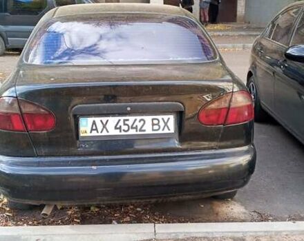 Черный Дэу Ланос, объемом двигателя 1.5 л и пробегом 238 тыс. км за 1950 $, фото 2 на Automoto.ua