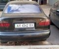 Черный Дэу Ланос, объемом двигателя 1.5 л и пробегом 238 тыс. км за 1950 $, фото 2 на Automoto.ua