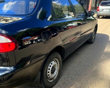 Черный Дэу Ланос, объемом двигателя 1.4 л и пробегом 220 тыс. км за 2400 $, фото 3 на Automoto.ua