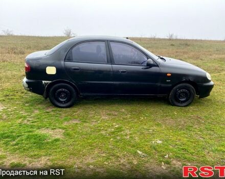 Чорний Деу Ланос, об'ємом двигуна 1.5 л та пробігом 256 тис. км за 1100 $, фото 3 на Automoto.ua