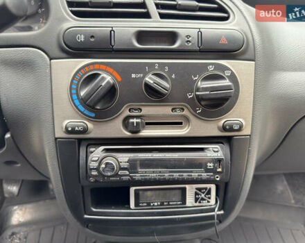 Черный Дэу Ланос, объемом двигателя 1.6 л и пробегом 156 тыс. км за 2400 $, фото 16 на Automoto.ua