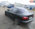 Чорний Деу Ланос, об'ємом двигуна 0 л та пробігом 215 тис. км за 1000 $, фото 3 на Automoto.ua