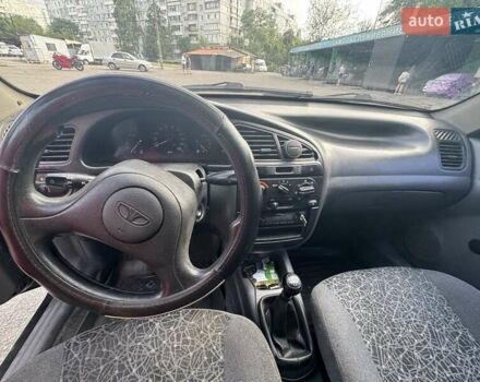Черный Дэу Ланос, объемом двигателя 1.5 л и пробегом 274 тыс. км за 2250 $, фото 10 на Automoto.ua