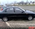 Черный Дэу Ланос, объемом двигателя 1.5 л и пробегом 220 тыс. км за 1000 $, фото 1 на Automoto.ua