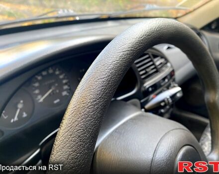 Дэу Ланос 2008 в Кривом Роге на Automoto.ua Черный Дэу Ланос, объемом двигателя 1.5 л и пробегом 105 тыс. км за 2700 $, фото 6 на Automoto.ua