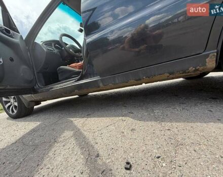 Дэу Ланос 2008 в Полтаве на Automoto.ua Черный Дэу Ланос, объемом двигателя 1.5 л и пробегом 245 тыс. км за 2400 $, фото 5 на Automoto.ua