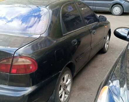 Черный Дэу Ланос, объемом двигателя 1.5 л и пробегом 238 тыс. км за 1950 $, фото 1 на Automoto.ua