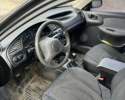 Черный Дэу Ланос, объемом двигателя 1.5 л и пробегом 219 тыс. км за 2300 $, фото 11 на Automoto.ua