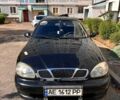 Чорний Деу Ланос, об'ємом двигуна 1.4 л та пробігом 252 тис. км за 1600 $, фото 2 на Automoto.ua