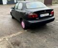 Черный Дэу Ланос, объемом двигателя 1.4 л и пробегом 202 тыс. км за 1400 $, фото 3 на Automoto.ua