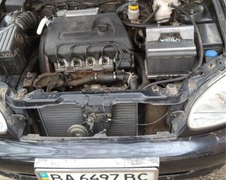 Черный Дэу Ланос, объемом двигателя 1.4 л и пробегом 1 тыс. км за 2000 $, фото 2 на Automoto.ua