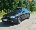 Черный Дэу Ланос, объемом двигателя 1.5 л и пробегом 157 тыс. км за 3200 $, фото 1 на Automoto.ua
