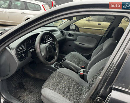 Чорний Деу Ланос, об'ємом двигуна 1.5 л та пробігом 246 тис. км за 2300 $, фото 7 на Automoto.ua