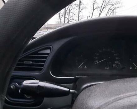 Черный Дэу Ланос, объемом двигателя 1.5 л и пробегом 450 тыс. км за 1750 $, фото 2 на Automoto.ua