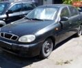 Черный Дэу Ланос, объемом двигателя 1.39 л и пробегом 160 тыс. км за 2400 $, фото 1 на Automoto.ua