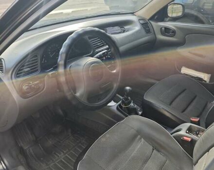 Деу Ланос 2008 у Запоріжжя на Automoto.ua Чорний Деу Ланос, об'ємом двигуна 1.5 л та пробігом 187 тис. км за 2350 $, фото 12 на Automoto.ua