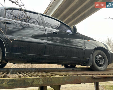 Черный Дэу Ланос, объемом двигателя 1.5 л и пробегом 219 тыс. км за 2300 $, фото 19 на Automoto.ua
