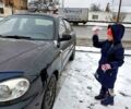 Черный Дэу Ланос, объемом двигателя 1.5 л и пробегом 190 тыс. км за 2550 $, фото 1 на Automoto.ua
