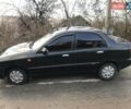 Чорний Деу Ланос, об'ємом двигуна 1.5 л та пробігом 250 тис. км за 3000 $, фото 1 на Automoto.ua
