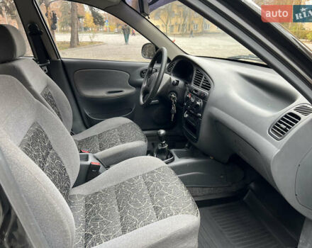 Чорний Деу Ланос, об'ємом двигуна 1.4 л та пробігом 89 тис. км за 2999 $, фото 14 на Automoto.ua