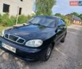 Черный Дэу Ланос, объемом двигателя 1.5 л и пробегом 251 тыс. км за 2300 $, фото 1 на Automoto.ua