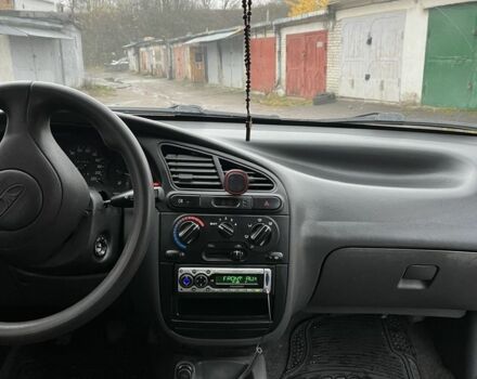 Черный Дэу Ланос, объемом двигателя 1.4 л и пробегом 108 тыс. км за 2500 $, фото 6 на Automoto.ua