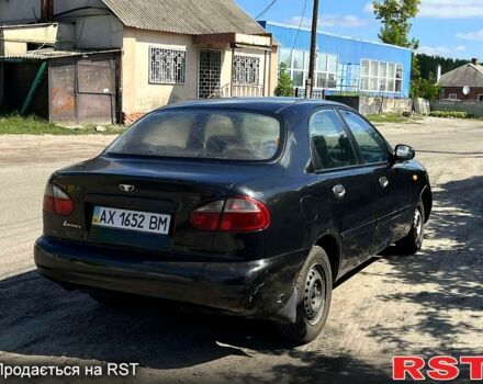 Черный Дэу Ланос, объемом двигателя 1.5 л и пробегом 150 тыс. км за 1150 $, фото 5 на Automoto.ua