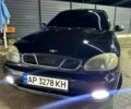 Черный Дэу Ланос, объемом двигателя 1.5 л и пробегом 250 тыс. км за 2800 $, фото 1 на Automoto.ua