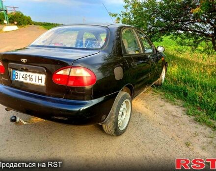 Черный Дэу Ланос, объемом двигателя 1.5 л и пробегом 368 тыс. км за 1150 $, фото 4 на Automoto.ua