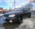 Черный Дэу Ланос, объемом двигателя 1.6 л и пробегом 184 тыс. км за 1800 $, фото 1 на Automoto.ua