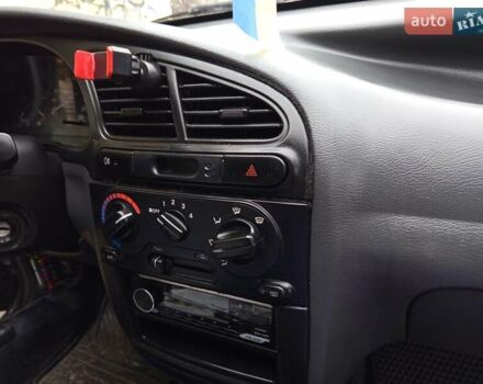 Черный Дэу Ланос, объемом двигателя 1.5 л и пробегом 180 тыс. км за 2300 $, фото 11 на Automoto.ua